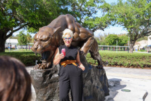 Emily Ellyn poses in front of FIU statue 1 - Coca-Cola Beverages Florida Emily Ellyn poses in front of FIU statue